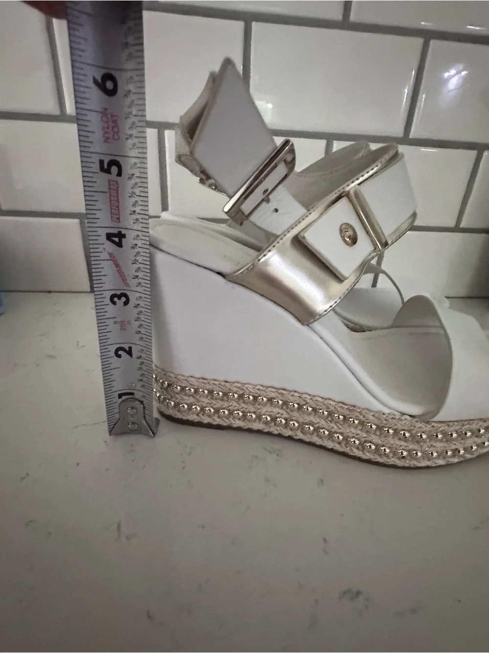 Nero Giardini wedge sandals feature a studded espadrille platform Size 37